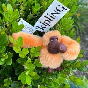 Kipling “Eli” Orange Mnky clip M